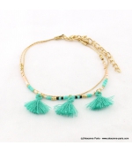 Bracelet avec perles rocaille et pompons Lina turquoise