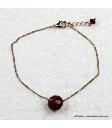 bracelet à la perle rouge
